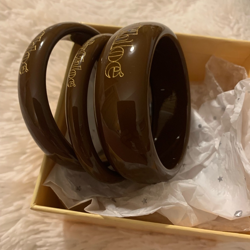 Chole’ by see. Goregous wooden bracelets. Excellent condition and comes w/ a box